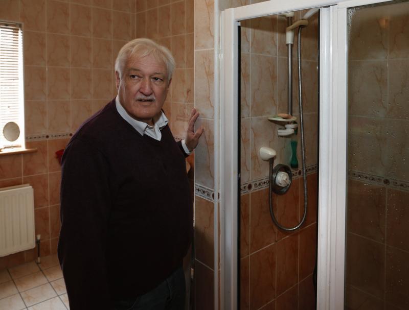 Trauma...Joe Wall at the shower in his home in Carraroe. Photo: Joe O'Shaughnessy.