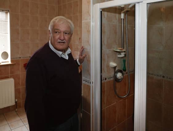 Trauma...Joe Wall at the shower in his home in Carraroe. Photo: Joe O'Shaughnessy.