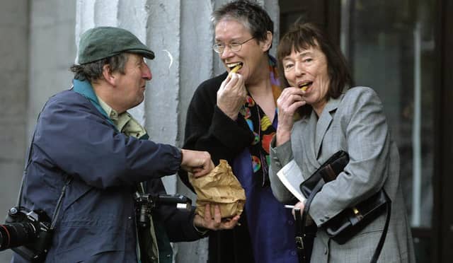 Nutan is rarely seen without a camera, as on this occasion during a Cúirt Literary Festival when he shared his chips with E Annie Proulx and Beryl Bainbridge. PHOTO: JOE O'SHAUGHNESSY.