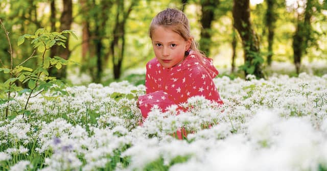 Honoria Wood from Foxford pictured in a woodland scene of wild garlic during Féile na Tuaithe at the National Museum of Ireland – Country Life. Photo: John Mee Photography.