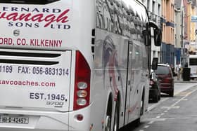 Cars parked in the coach parking bays on Merchants Road