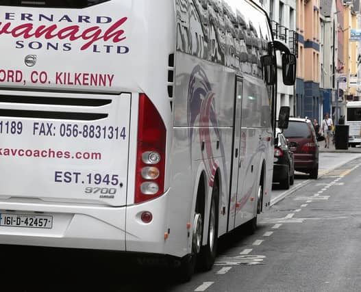 Cars parked in the coach parking bays on Merchants Road