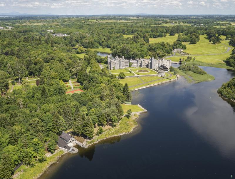 The new boathouse is in the foreground, with Ashford Castle behind.