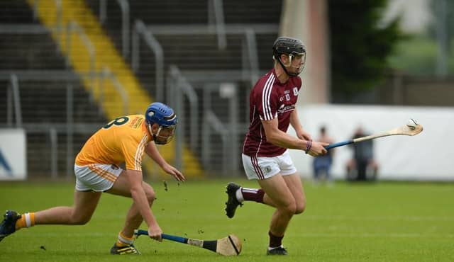 Galway's Jack Canning in action against Daniel Black of Antrim during their easy All-Ireland minor quarter-final win. The young Tribesmen take on Tipperary at Croke Park on Sunday.