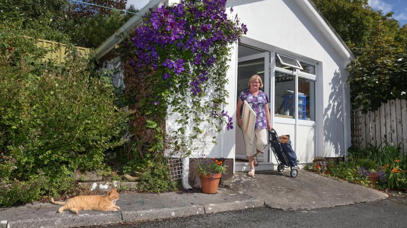 Geraldine Folan leaving her studio to go painting on the Salthill Promenade.   Photo: Joe O'Shaughnessy.