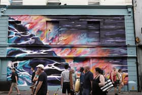The controversial mural on the dilapidated former Taaffes premises on William Street. Photo: Joe O'Shaughnessy.