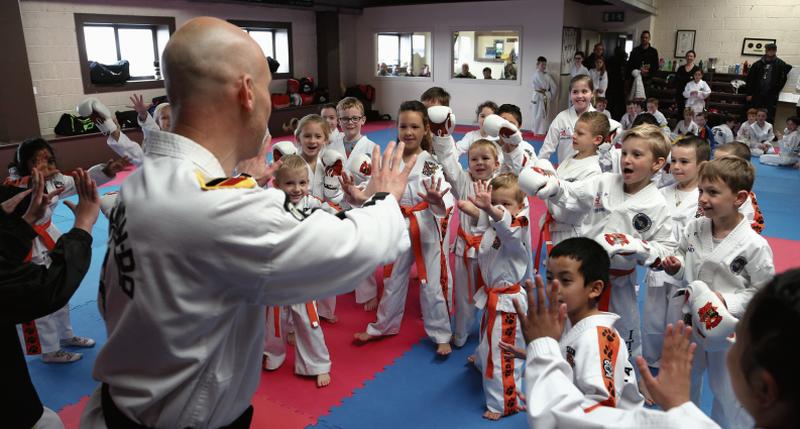 Shane FitzGibbon of Connacht Taekwondo demonstates some of the techniques of the martial art to a class of young children. Photos: Joe O'Shaughnessy.