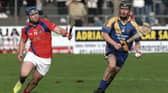 Loughrea's Neil Keary is chased by St Thomas' Bernard Burke during  2025 county senior semi-final at Kenny Park, Athenry