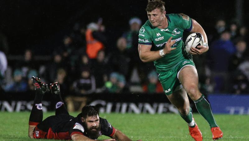 Connacht centre Peter Robb leaves Edinburgh's Cornell Du Preez trailing in his wake during Friday night's Guinness Pro12 clash against Edinburgh. Photo: Joe O'Shaughnessy.