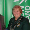 Badminton Ireland President Betty Thompson presents Shane Wynne of Oranmore Badminton Club with the 'Coach of the Year' award at a function in the Hilton Hotel, Dublin Airport last Saturday.