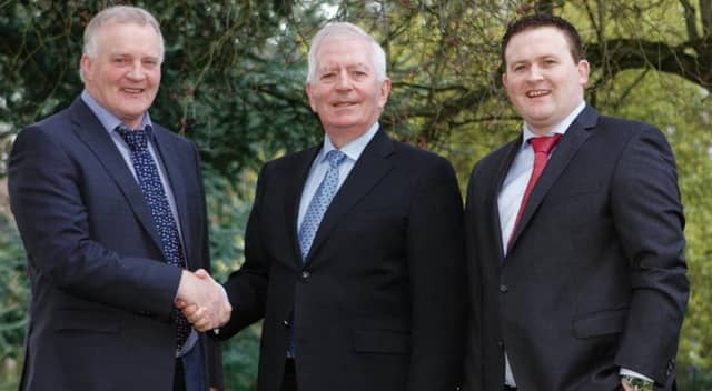 ECC chairman PJ Fahy welcomes Charlie McCreevy on board as a non-executive director, joined by Daryl Fahy, Managing Director, ECC.