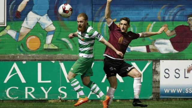 Galway United's Lee Grace and former United captain, Ryan Connolly, battle for possession in Eamonn Deacy Park on Monday night. Photo: Joe O'Shaughnessy.