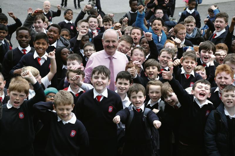 Some of the pupils with Michael Gallagher on his last day as School Principal at Scoil Einde. Photos: Joe O'Shaughnessy.