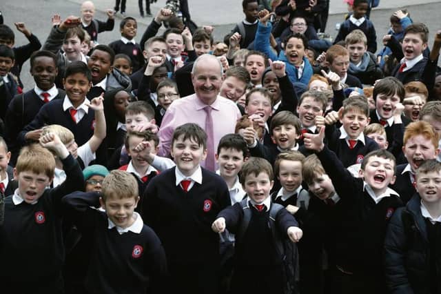 Some of the pupils with Michael Gallagher on his last day as School Principal at Scoil Einde. Photos: Joe O'Shaughnessy.