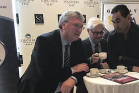 It's all in the tea leaves . . . Oranmore/Maree GAA Chairman Gerry Rabbitte (centre) and guest speakers Pat McDonagh of Supermac's and Connacht Head Coach Pat Lam discuss the development of the GAA club's 24-acre site in Rinville, details of which were announced at a fundraiser breakfast at the Lough Rea Hotel last week.