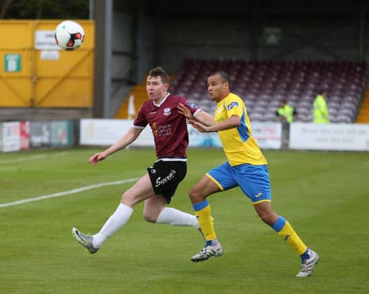 Galway United's Padraic Cunningham and Finn Harps' Ethan Boyle follow the flight of the ball during Friday night's Premier Division tie at Eamonn Deacy Park. Photo: Joe O'Shaughnessy.