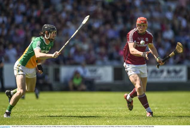 Galway attacker Conor Whelan is about to pick off one of his seven points despite the best efforts of Offaly's Ben Conneely during Sunday's Leinster semi-final in Portlaoise
