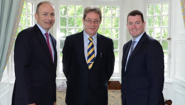 There was no sign of Gaeilgeoir, Galway West TD Éamon Ó Cuív, when his Fianna Fáil leader, Micheál Martin and Galway City Councillor Peter Keane met with NUIG President James Browne (centre) at the university last week. One wonders did the trio chat in Irish?