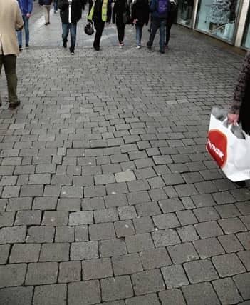 The uneven surface on Shop Street