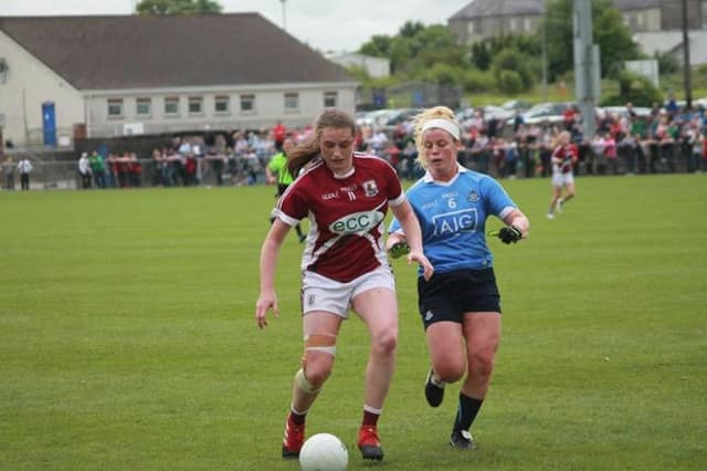 Galway attacker Niamh Daly gets to the ball ahead of Dublin's Siabh Hannigan in the All-Ireland minor ladies football semi-final in Mullingar last Saturday.