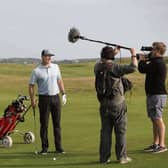 Matt Ginella and the TV crew during filming for the Golf Channel.