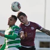 Galway United's Gavan Holohan wins this ariel duel with Graham Burke of Shamrock Rovers during the SSE Airtricity League tie at Eamonn Deacy Park on Friday. Photo: Iain McDonald.