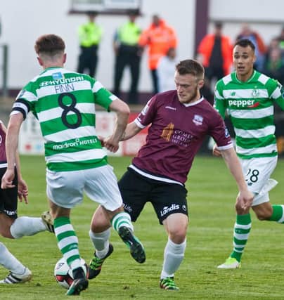 Galway United's David Cawley is challenged by Ronan Finn of Shamrock Rovers during the SSE Airtricity League tie at Eamonn Deacy Park on Friday evening. Photo: Iain McDonald.