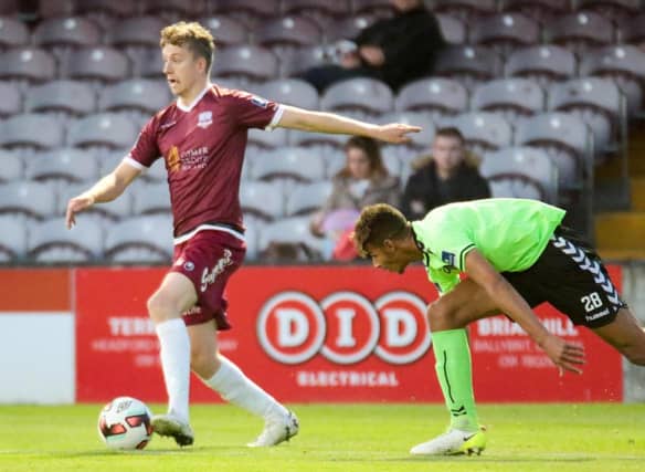 Galway United's Eoin McCormack on the attack against Limerick FC's Barry Cotter during Friday night's FAI Cup quarter-final at Eamonn Deacy Park.