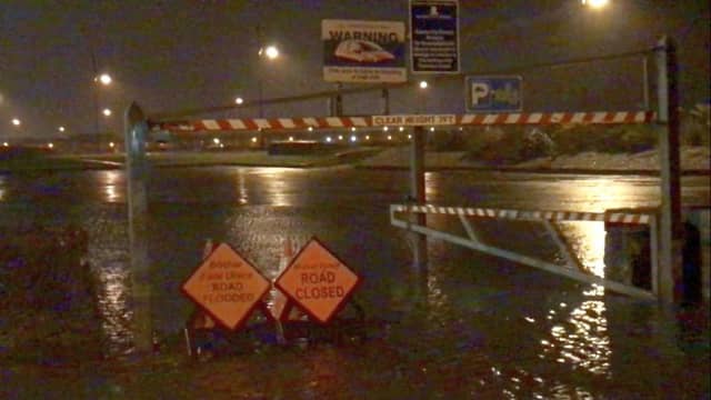 Flooding at the entrance to Toft Carpark during Storm Brian