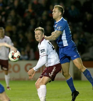 Galway United's Eoin McCormack comes under strong pressure from Jordi Balk of St Patrick's Athletic during Friday night's Premier Division tie at Eamonn Deacy Park. Photo: Joe O'Shaughnessy.
