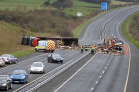 The aftermath of the accident in which an articulated truck veered across the central barrier before overturning on the M6 near Ballinasloe on Monday. Photo: Hany Marzouk.