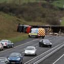 The aftermath of the accident in which an articulated truck veered across the central barrier before overturning on the M6 near Ballinasloe on Monday. Photo: Hany Marzouk.