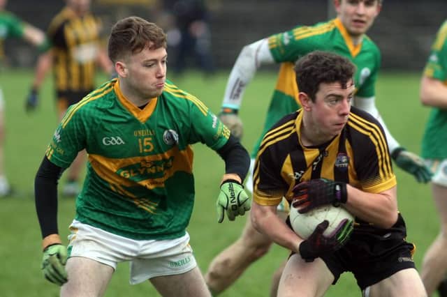 Mountbellew-Moylough’s Ger Donoghue secures possession ahead of Claregalway's Keelan Grainger during Saturday's North Board U-21 A Football Final at Tuam Stadium.