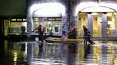 Members of Galway Fire Brigade help people getting in and out of their accomodation and homes between the flooded Fr Griffin Road and Dominick Street areas following Storm Eleanor. Photo: Joe O'Shaughnessy.