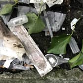 Discarded drugs paraphernalia at 'The Plots' in Woodquay, including a syringe, spoons and sterile water used for heroin injection. PHOTO: ENDA CUNNINGHAM
