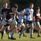 NUI Galway's Damien Comer comes under pressure from UCD' Conor McCarthy in the Sigerson Cup final on Saturday.