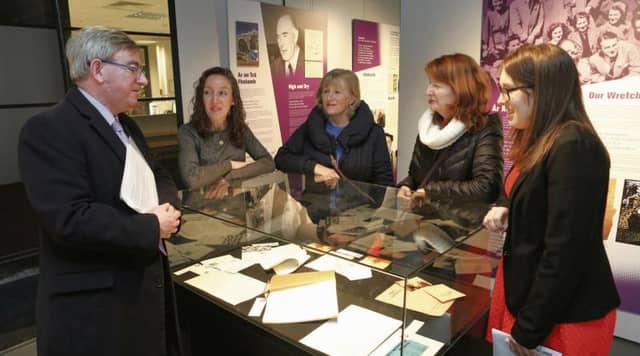 NUIG President Professor Ciarán Ó hÓgartaigh; NUIG researcher and Árainn native, Dr Deirdre Ní Chonghaile; members of Mná Fiontracha and Árainn natives, Áine Uí Fhlaithearta agus Bairbre Uí Chonghaile; and NUIG researcher and exhibition curator, Síobhra Aiken. pictured with items from the Máirtín Ó Direáin exhibition at NUIG’s Hardiman Building.