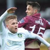 Galway United's two-goal hero Conor Barry tussling for possession with Cabinteely's Andy O'Reilly during Friday night's First Division tie at Eamonn Deacy Park.