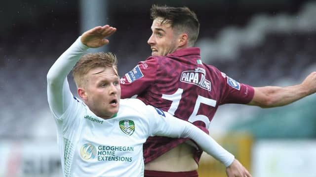 Galway United's two-goal hero Conor Barry tussling for possession with Cabinteely's Andy O'Reilly during Friday night's First Division tie at Eamonn Deacy Park.