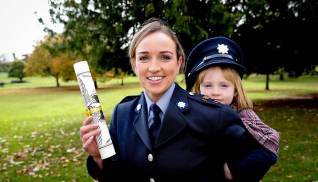 Galway Garda Maria Freeley with her four year old daughter Sarah Jane after she was awarded a Certificate of Bravery.
