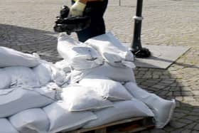 Sandbags being distributed at Fishmarket Square.