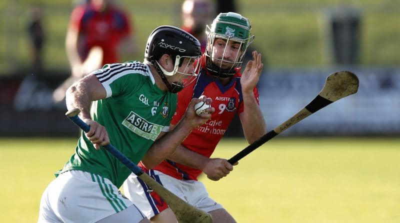 Liam Mellows' David Collins tries to break past the challenge of St Thomas' David Burke during the clubs' senior hurling championship group clash in September.