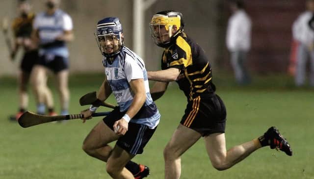Ballygar's Eric Walsh tries to break away from Alan Caulfield of Ballinasloe during the County Junior 1 hurling final in Loughgeorge last Thursday. Photos: Joe O'Shaughnessy.