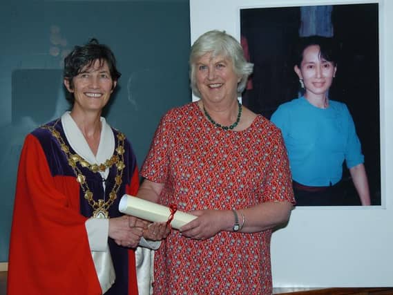 Labour’s payback . . . the then mayor of Galway, Cllr Catherine Connolly, presents the Freedom of the City in 2005 to Lucinda Philips, the sister-in-law of Aung Suu Kyi, who accepted the award on her behalf.