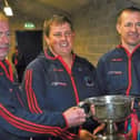 The St. Thomas' management celebrate after their county SHC final victory over Liam Mellows. Left to right: Kenneth Larkin, Claude Geoghegan, Kevin Lally and TJ Ryan.