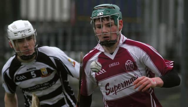 Presentation College, Athenry's Gavin Lee is chased by Gort Community School's Tadhg Dean during the Connacht Post Primary Schools Senior A hurling final in Ballinasloe on Saturday. Photos: Enda Noone.
