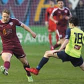 Galway United's Joe Collins is challenged by Stephen O'Leary of Cobh Ramblers during Friday night's First Division tie at Eamonn Deacy Park. Photo: Joe O'Shaughnessy.