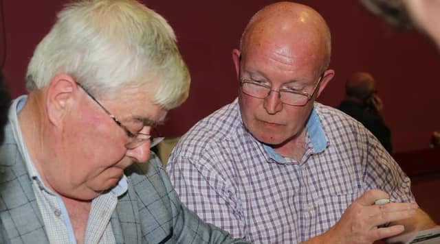 Out of luck…outgoing Cllr Tom Mc Hugh and Sean Dunleavy going through the numbers.