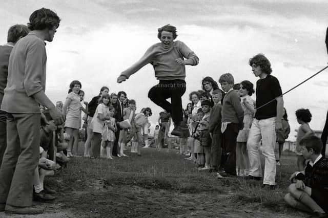 SHANTALLA, 1971
Ronny Howard, Ó Connaire Road Shantalla, taking part in the open long jump event at Shantalla Sports, July 1971.