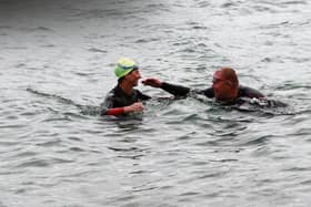 Denise Dolan and Olaf O’Neill, swimming in memory of their sister Gráinne arrive first home at The Frances Thornton Memorial Galway Bay Swim in aid of Cancer Care West. Photos: Brian Harding.